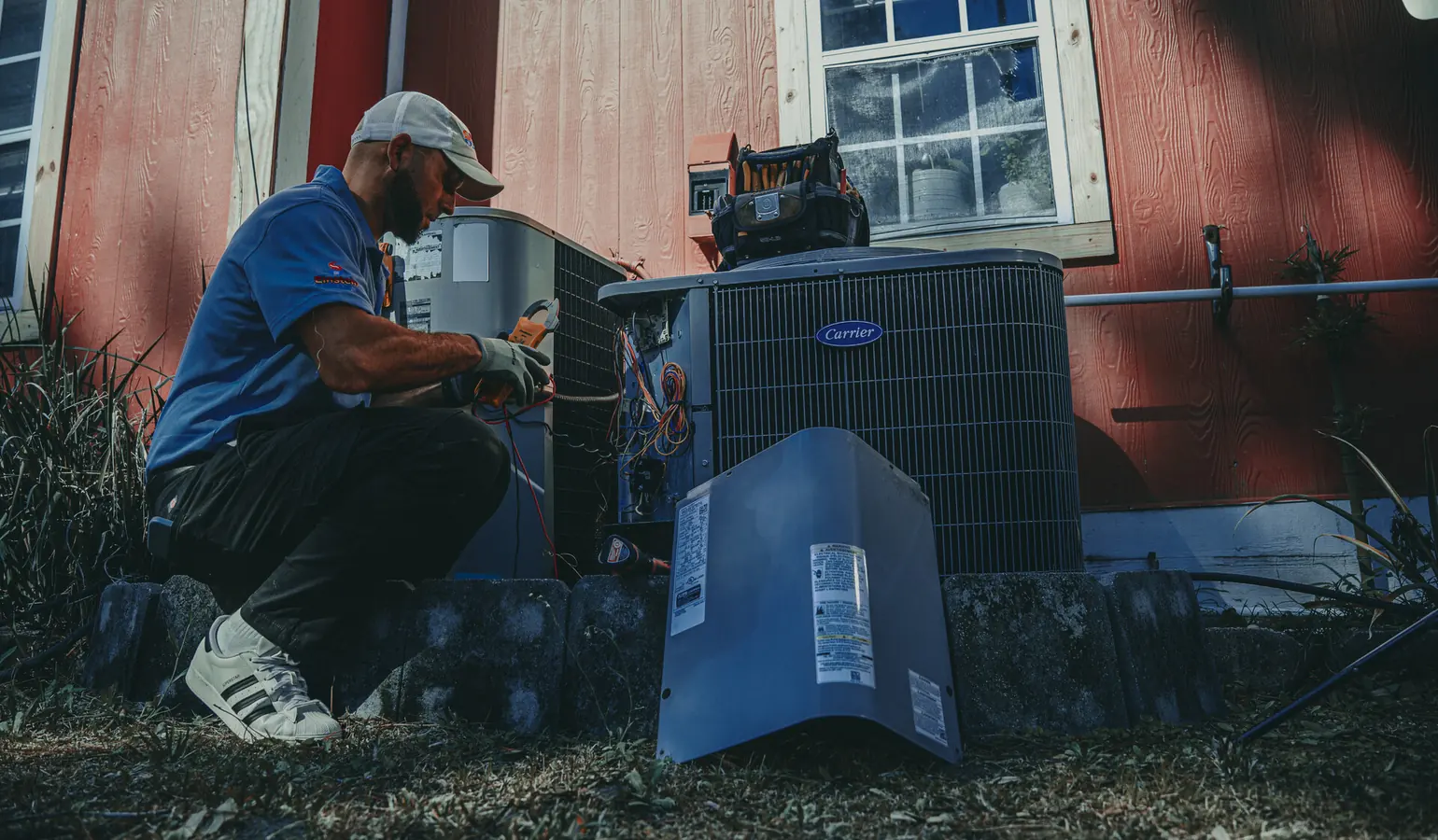 Einstein technician installing an air conditioning system in Jacksonville, FL