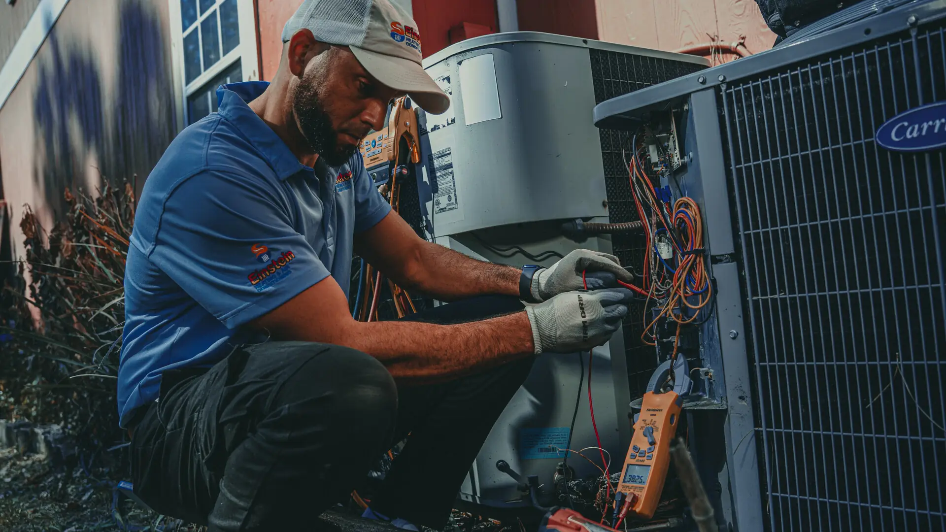 Einstein technician repairing an air conditioner in Jacksonville, FL