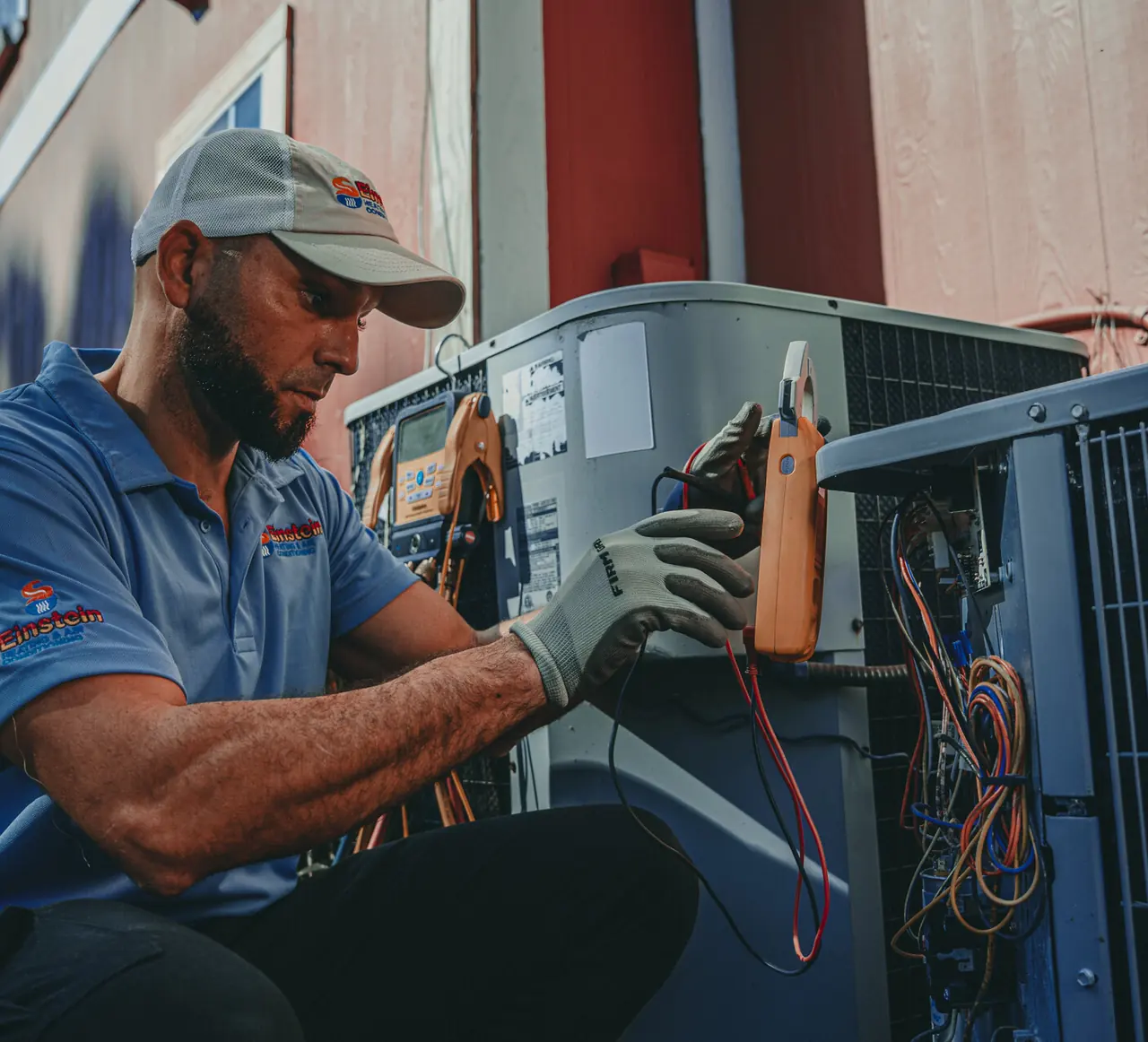 Einstein technician checking air conditioner performance